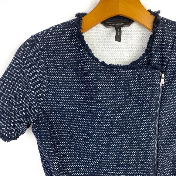 BCBGMAXAZRIA | Viviayne Blue Zip Front Peplum Top - Picture 8 of 16